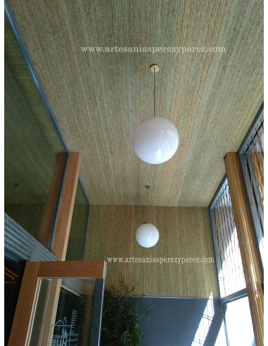 Interiorismo en forrado de paredes y techos con esparto natural