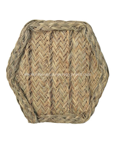 Hexagonal wall sconce in natural esparto