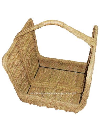 Tall firewood basket made of natural esparto with esparto handle